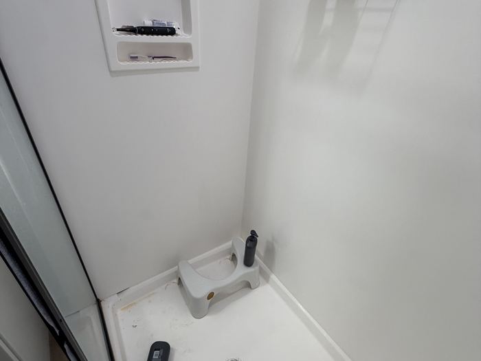 Shower stall before cleaning, Casa Grande, AZ